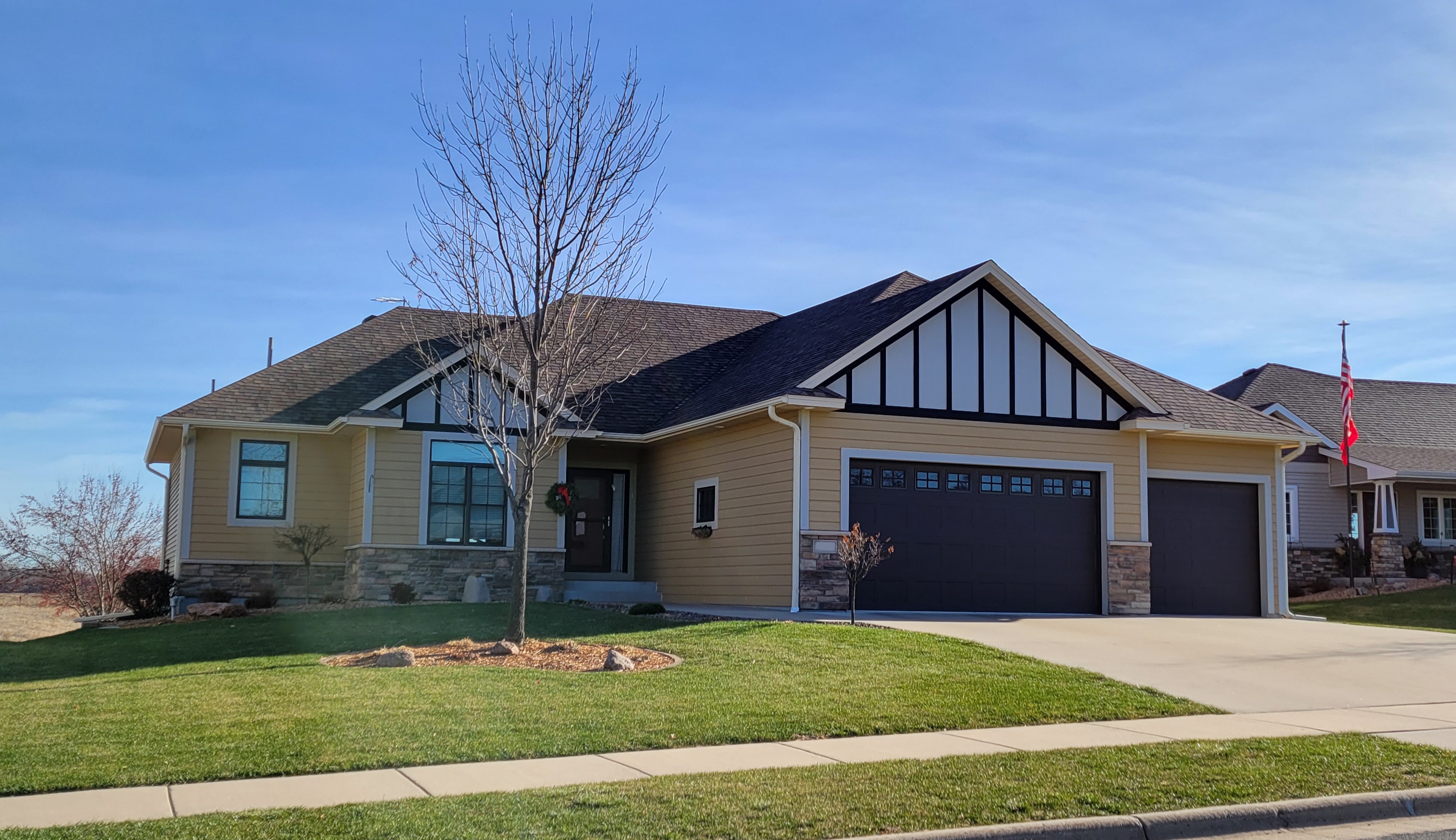 A house with a new roof installed by our roofers.